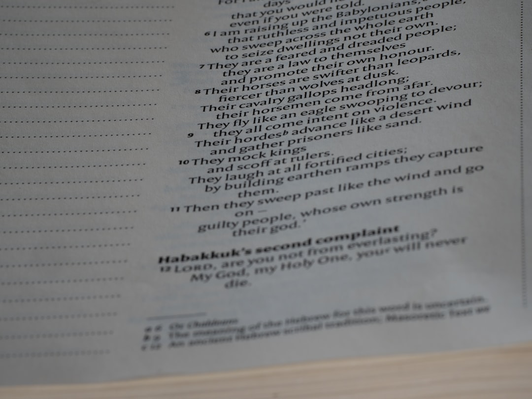 person proofreading document