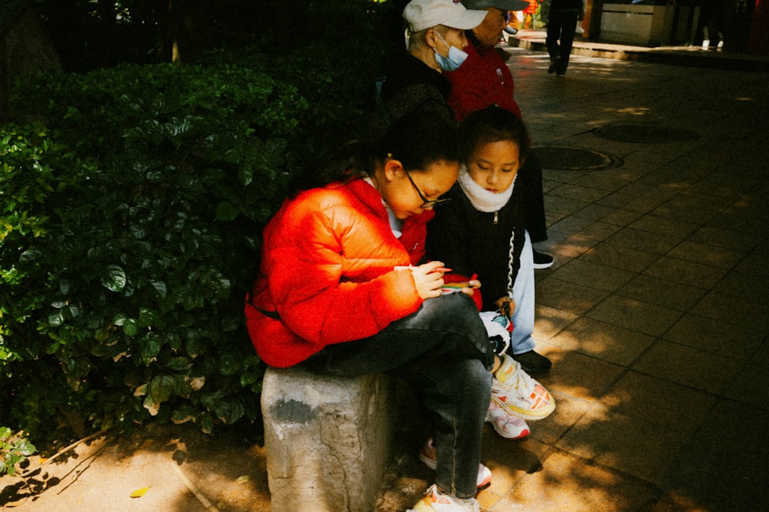 parent kneeling to talk to child