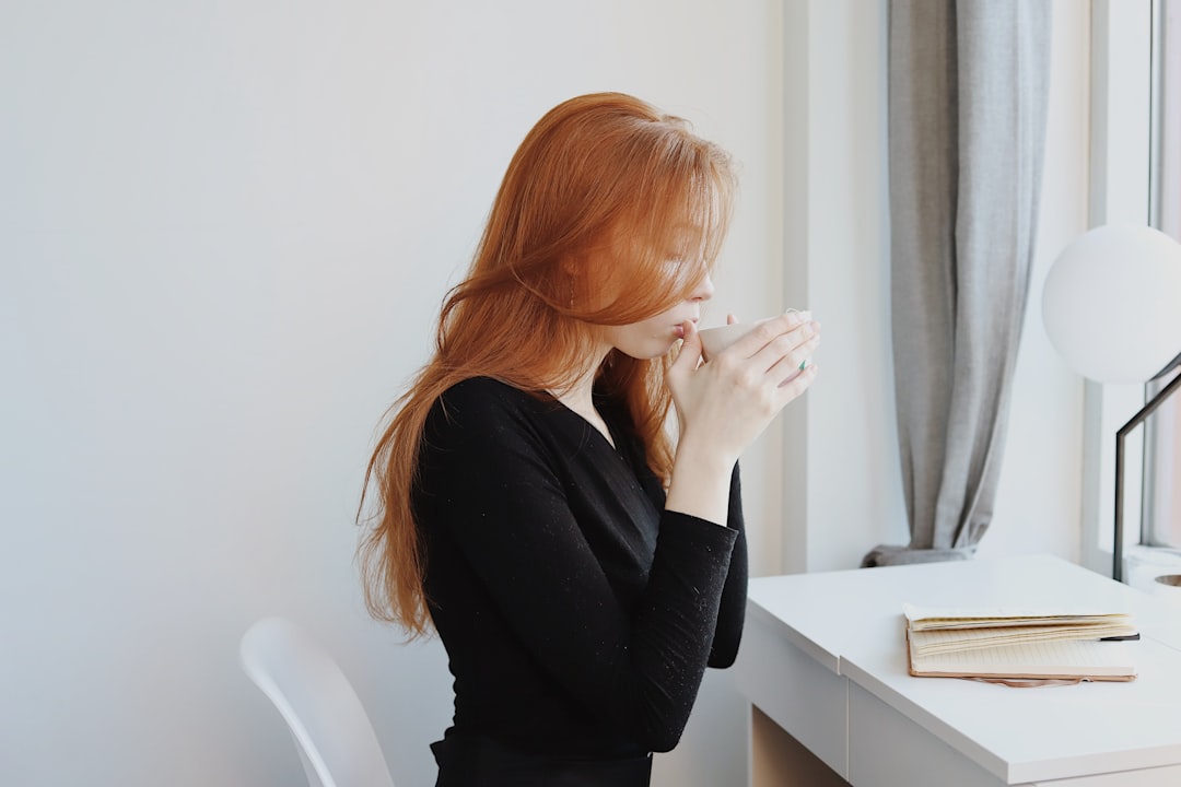 person meditating in office