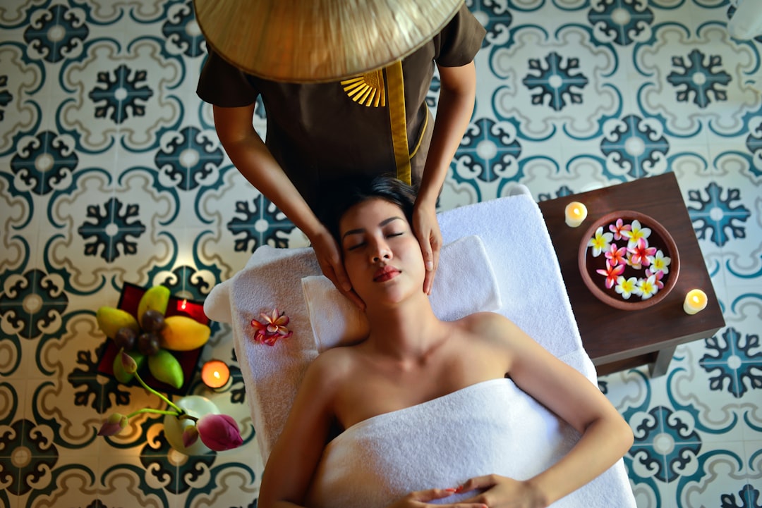 woman receiving facial massage